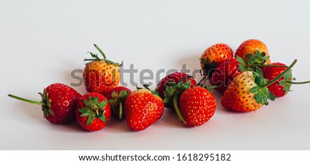 Beautiful red strawberries on white background Royalty-Free Stock Photo #1618295182