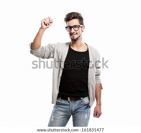 Portrait of a handsome young man wearing glasses and  writting something on a glass writeboard
