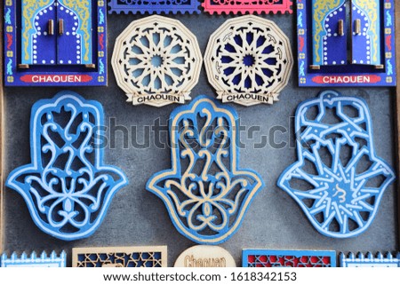 Close up of colorful souvenirs, Moroccan style, on the wall. Royalty-Free Stock Photo #1618342153