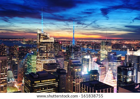 New York City skyline aerial view at dusk with skyscrapers of midtown Manhattan.