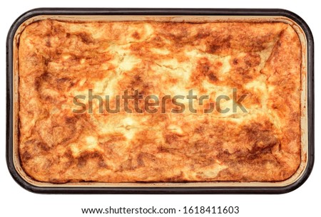Freshly Baked Cheese Crumpled Pie in Old Enameled Metal Casserole Baking Pan Isolated on White Background