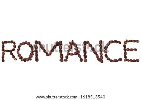 Romance quote made with roasted coffee beans placed on white background from the top view can use for your messages