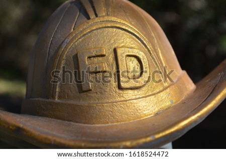 Fireman hat with gold for background