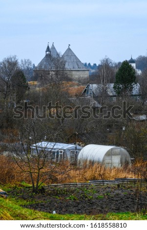 landscape with a picture of a fortress in Staraya Ladoga, Russia