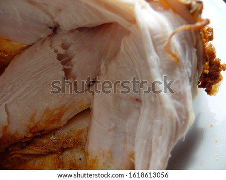 Meat from a fried chicken close up