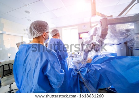 Da Vinci Surgery. Robotic Surgery. Medical operation involving robot. Royalty-Free Stock Photo #1618631260