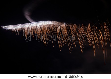 Beautiful fireworks of new year 2020 created by planes in Albufeira city, Portugal.