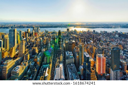 Aerial panoramic view. on Midtown district of Manhattan in New York. Hudson river is on the background. Metropolitan City skyline, USA. American architecture building. Panorama of NYC. Mixed media.