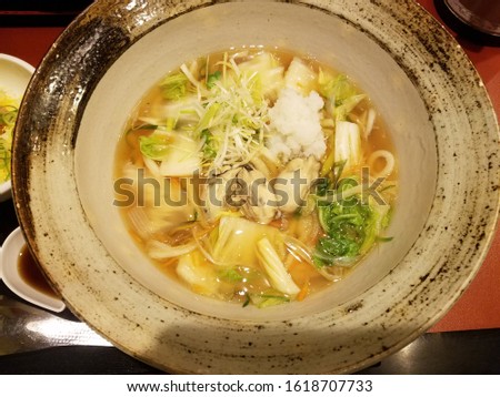 Udon noodles with oyster and grated radish.