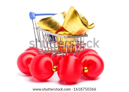 A picture of shopping cart with golden "yuanbao" or Chinese sycee. It is a symbol of wealth and prosperity.