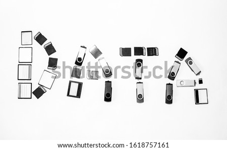 The word data spelled with memory cards and thumbdrives