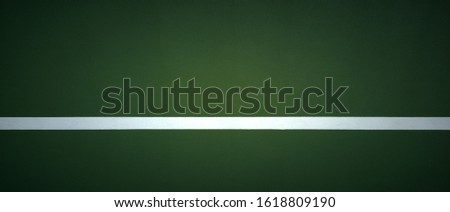 Beautiful dark green tennis sports wall pictures by taking pictures from a straight perspective.