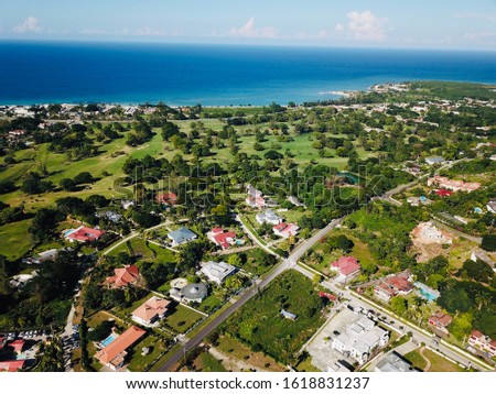 North coast of Jamaica, Runaway Bay St Ann. Highlighting the beach front properties  Royalty-Free Stock Photo #1618831237