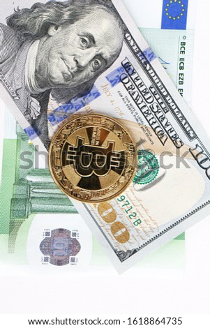 US Dollars, Euro and bitcoin coin