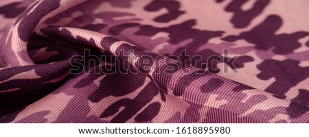 Background design texture, red silk fabric, abstraction, copyright print military camouflage fleece fabric, your designs will allow you to be military,