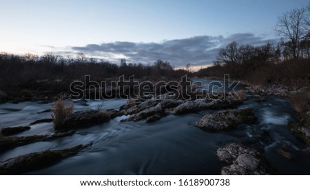 river landscape at night, taken at rhine river in southern germany, isteiner schwellen.
