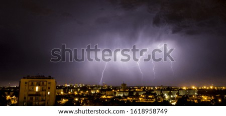 Thunderstorm and lightning over a city in France