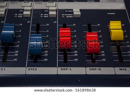 Buttons and tabs in various parts of the audio controller