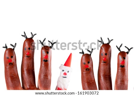 funny reindeer and Santa painted on fingers