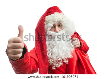 Santa Claus in a red hat with a bag on his shoulders