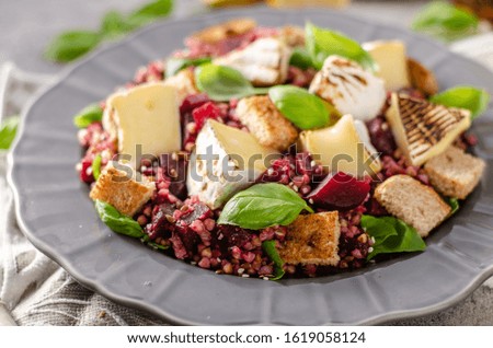 Beautiful salad from buckwheat and beet with grilled fish