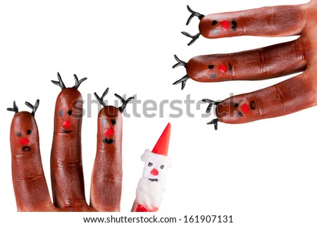 funny reindeer and Santa painted on fingers