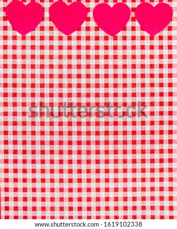 red and white Vichy fabric background for Valentine's Day with pink hearts. valentines day concept