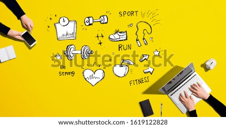 Fitness and diet with people working together with laptop and phone