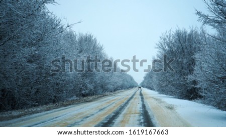  track swept with snow and sprinkled with sand
                          