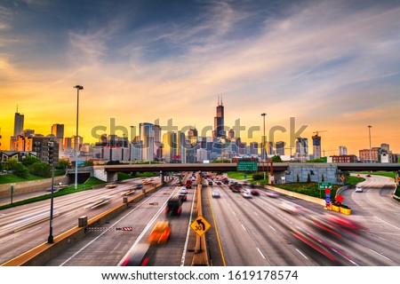 Chicago, IL, USA downtown cityscape highways at dawn. Royalty-Free Stock Photo #1619178574