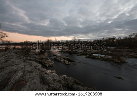 river landscape at evening in southern germany, at rhine river.