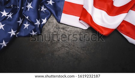American flag on dark metallic with free space. 4th July Veterans or US Independence day.