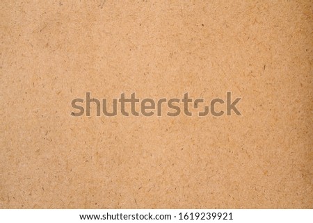 Brown fiberboard closeup texture background. Cartoon texture Royalty-Free Stock Photo #1619239921