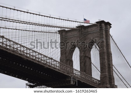 Close up on Brooklyn Bridge cloudy day