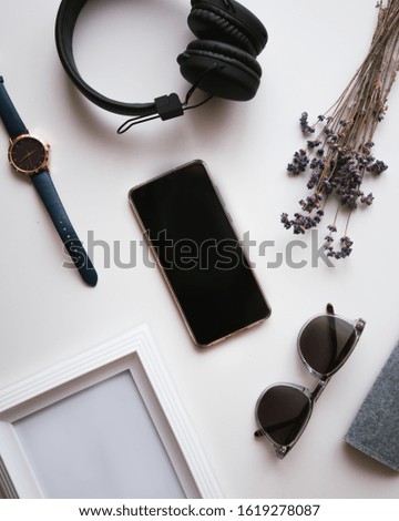 Style technology mockup. Cool business startup concept. Modern accessories, watches, headphones, glasses, picture, lavender. Minimalist, white background.