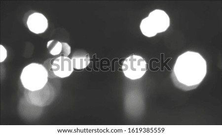 Black shiny bokeh background. suitable for wallpapers project design.