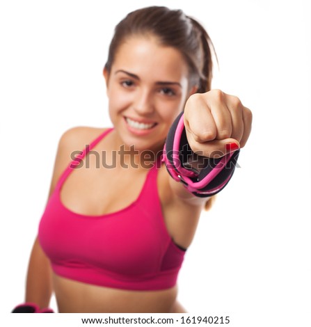 young sporty woman punching with weights isolated on white