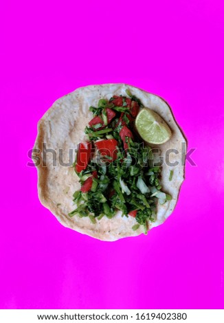 Delicious vegan tacos on pink background. vegan food