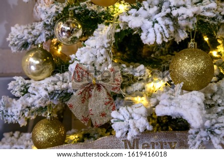 Christmas decoration on photo studio. Beautiful Christmas tree with golden balls