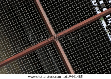 Chain link fence with a black background