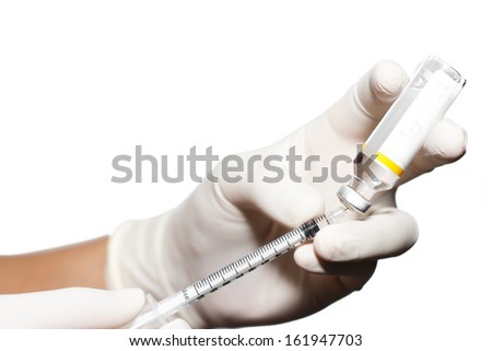 Syringe out medication technique from the ampule. Close up isolated on white background.