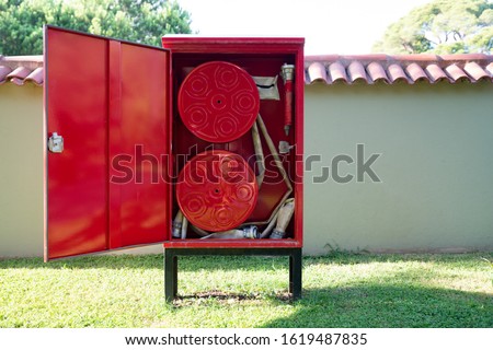 Fire Hose Reel Outdoors. Fire Safety Concept