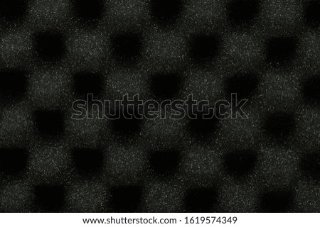 Black audio foam surface close up view