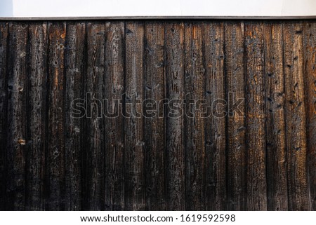 Wood cladding on the wall.