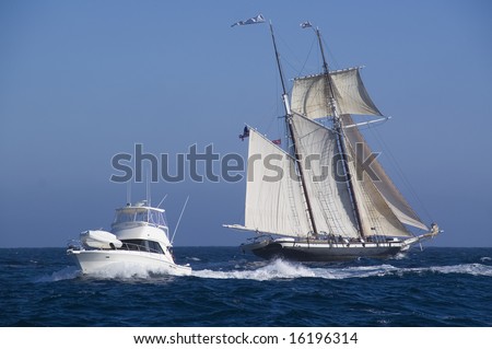 Tall Ship and Modern Boat