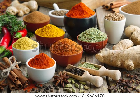 Various aromatic colorful spices and herbs. Ingredients for cooking.
Ayurveda treatments. Royalty-Free Stock Photo #1619666170
