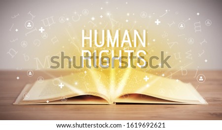 Open book with HUMAN RIGHTS inscription, social media concept