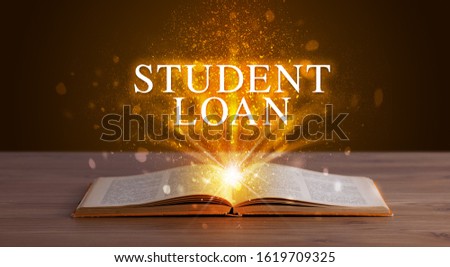 STUDENT LOAN inscription coming out from an open book, educational concept