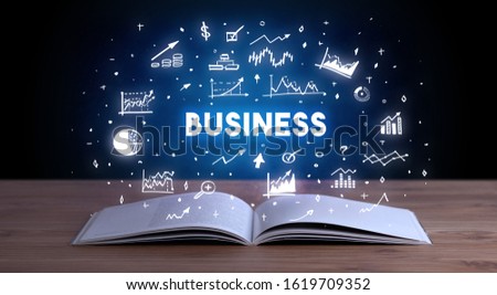 BUSINESS inscription coming out from an open book, business concept