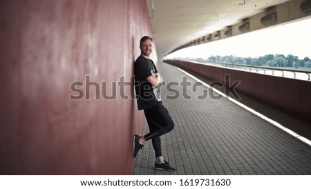 Portrait of a young urban sportsman. Sport street fashion.